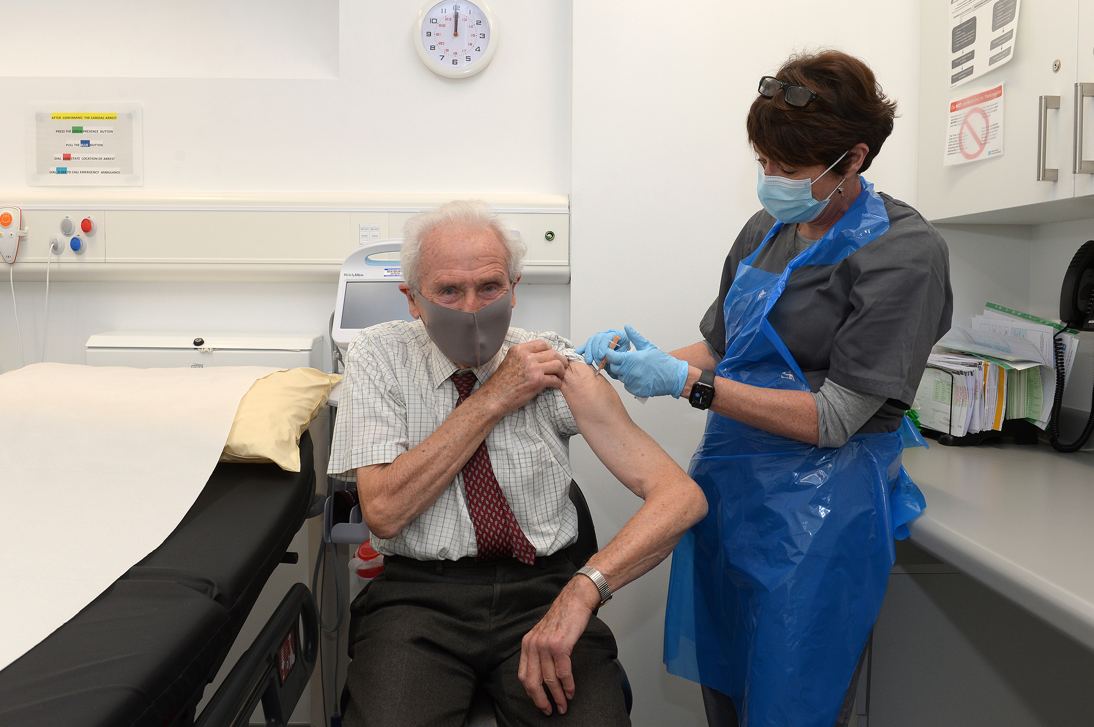 Retired GP and wife first to receive new Covid-19 jab