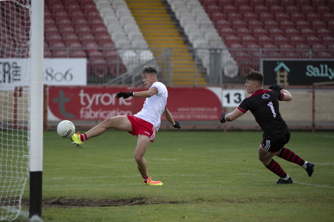 Cormac the star man as Tyrone Minors go through