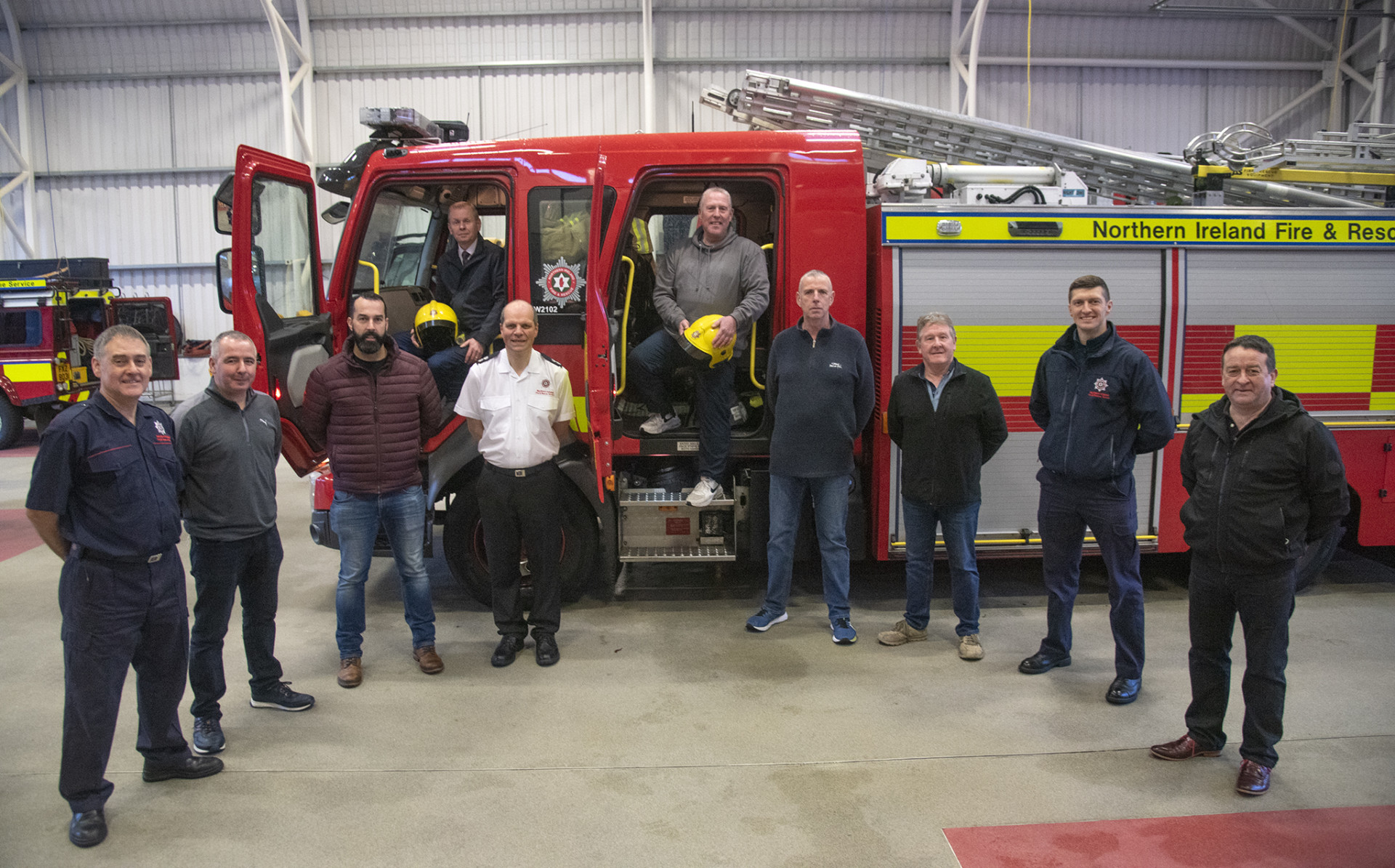 Omagh firefighters blow out the candle after 30 years service