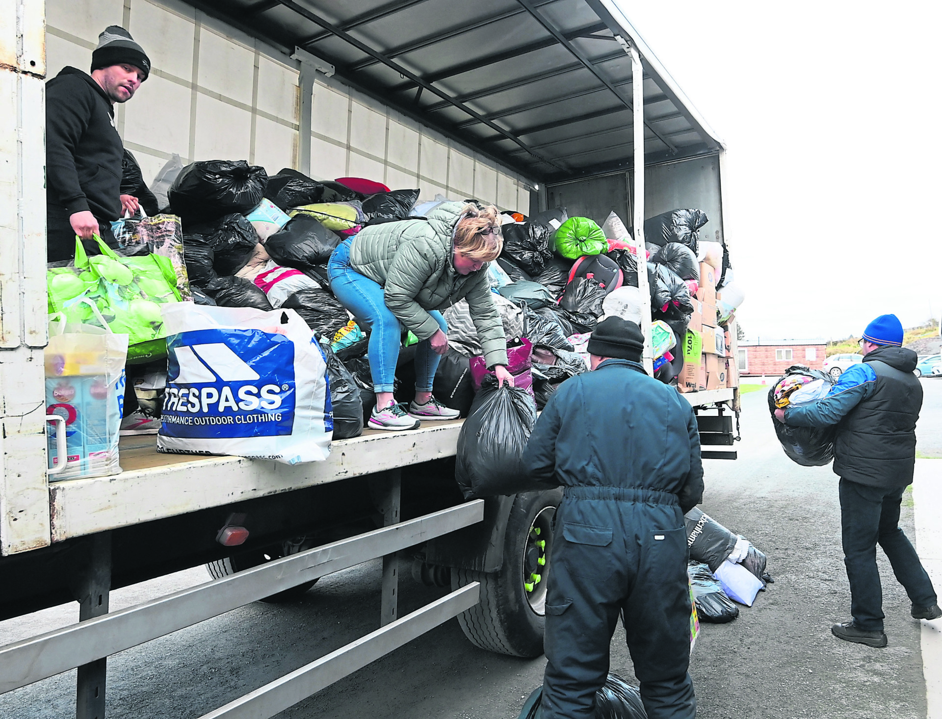 Truck-loads of supplies leaving Tyrone for Poland