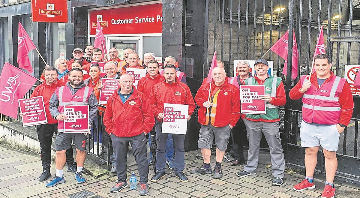 Underpaid and frustrated posties on the picket lines
