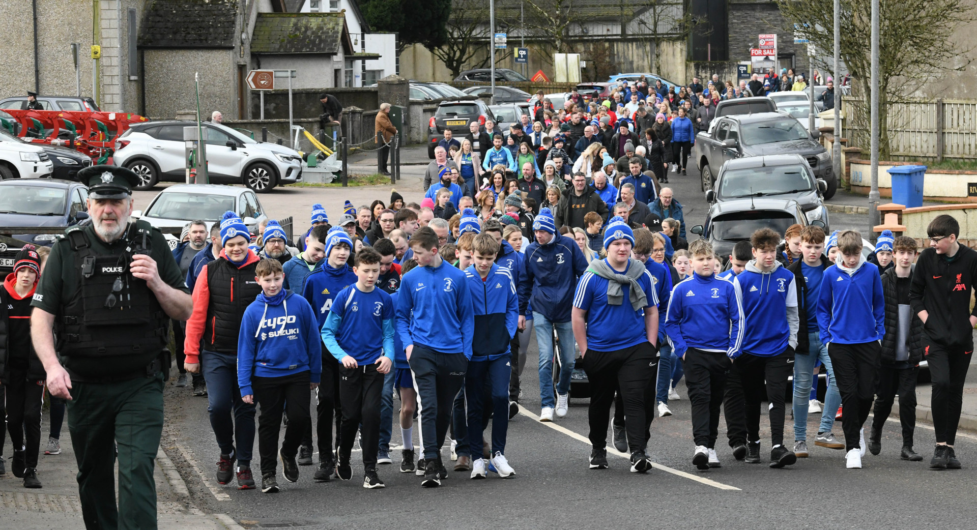 Young Beragh Swifts players take part in walk through village