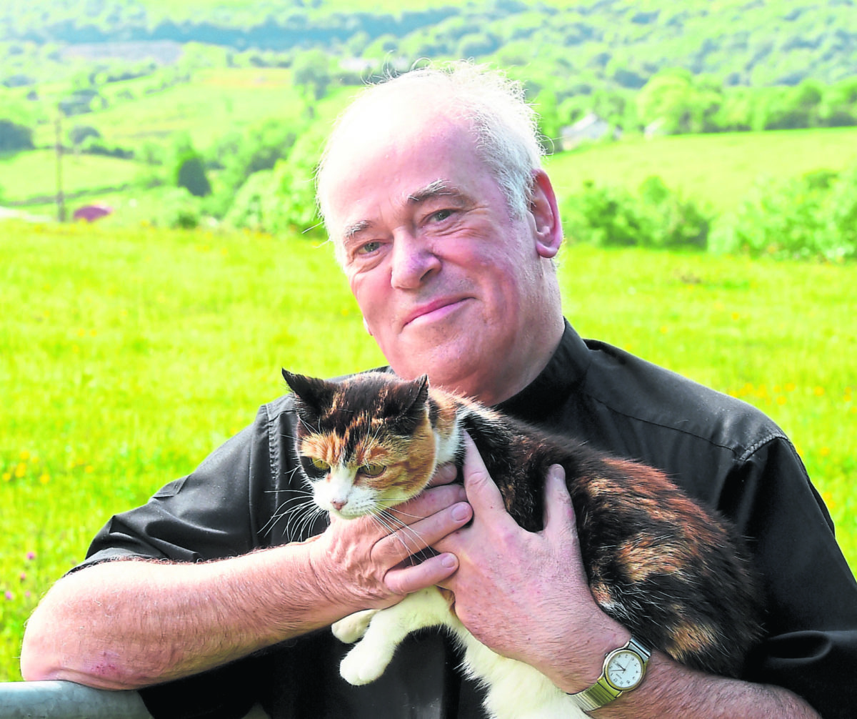 Tributes paid to beloved priest and renowned peacemaker