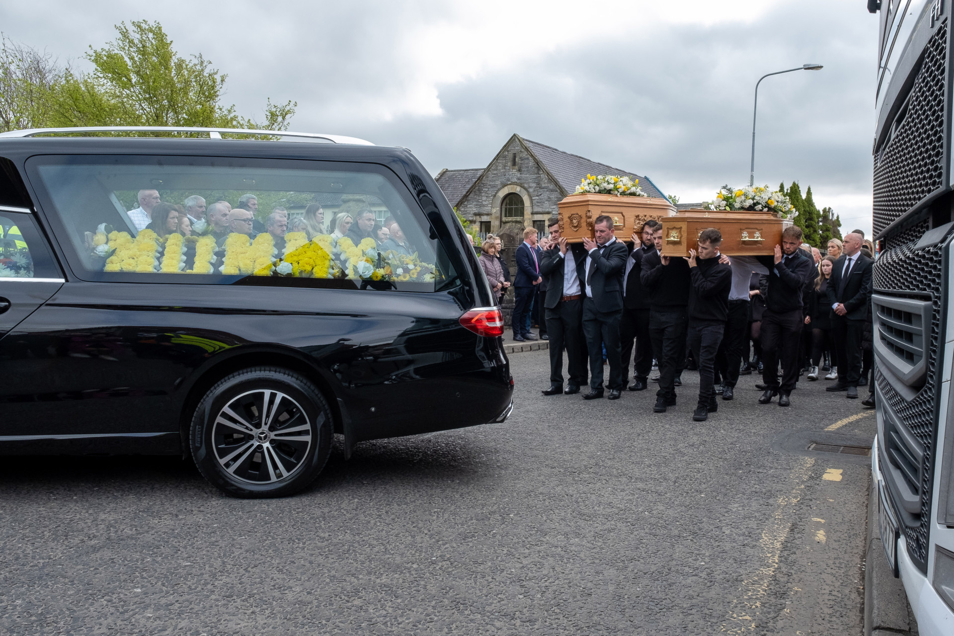 Children’s poignant tribute to parents at double funeral