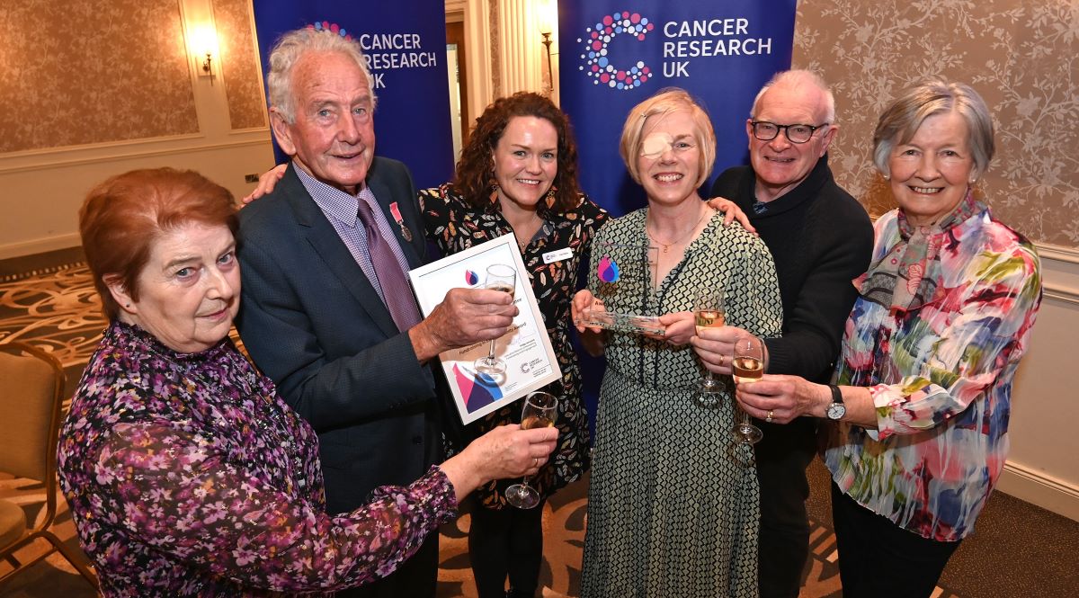 ‘Flame of Hope’ for cancer research volunteers who raised £1m