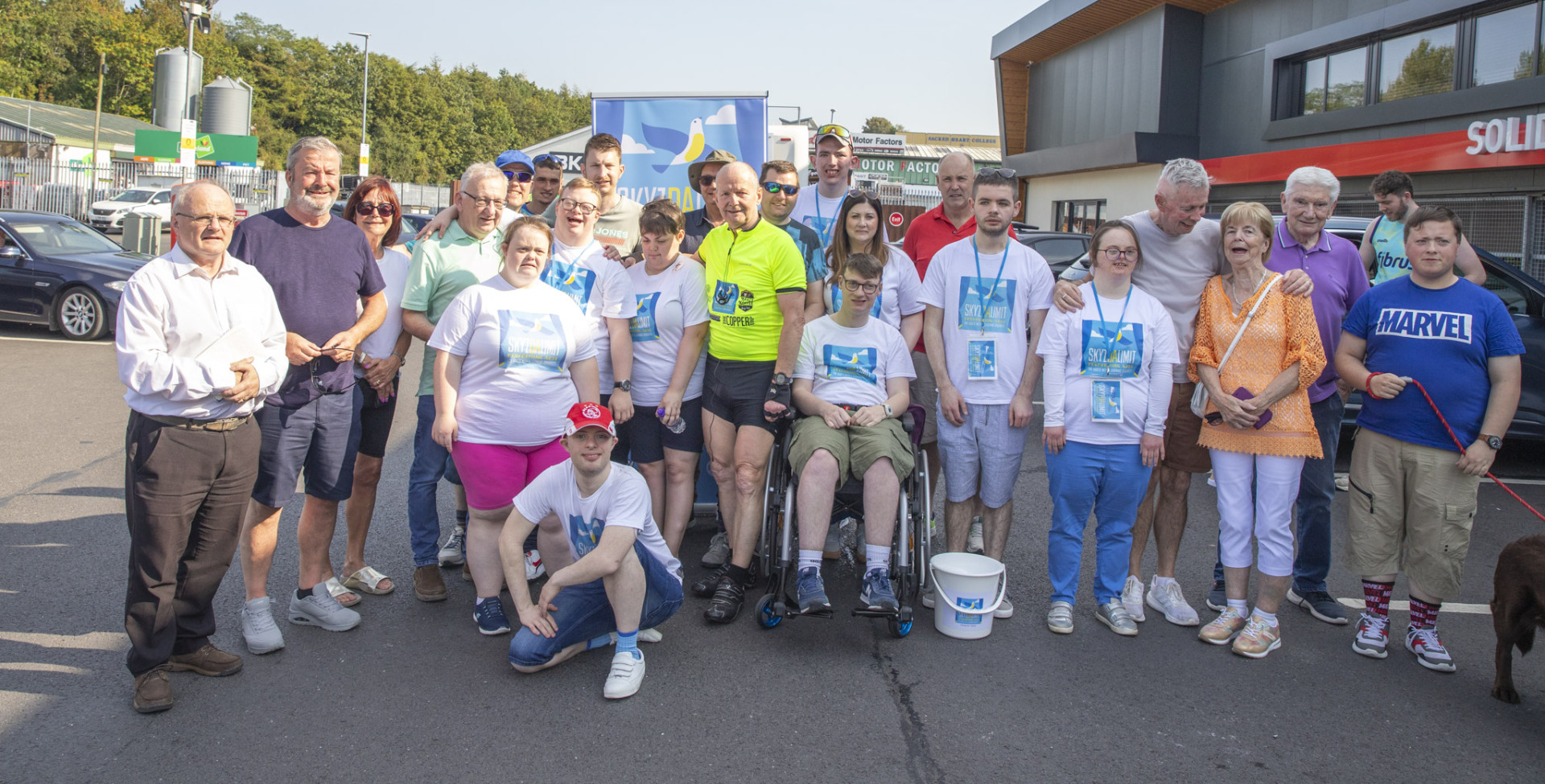 Celebrations as John journeys through Omagh during charity cycle