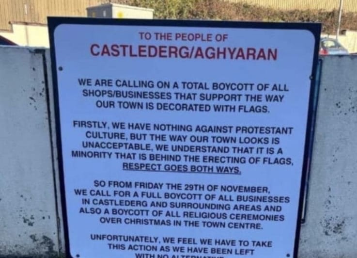 MLA condemns ‘offensive’ sign calling for boycott