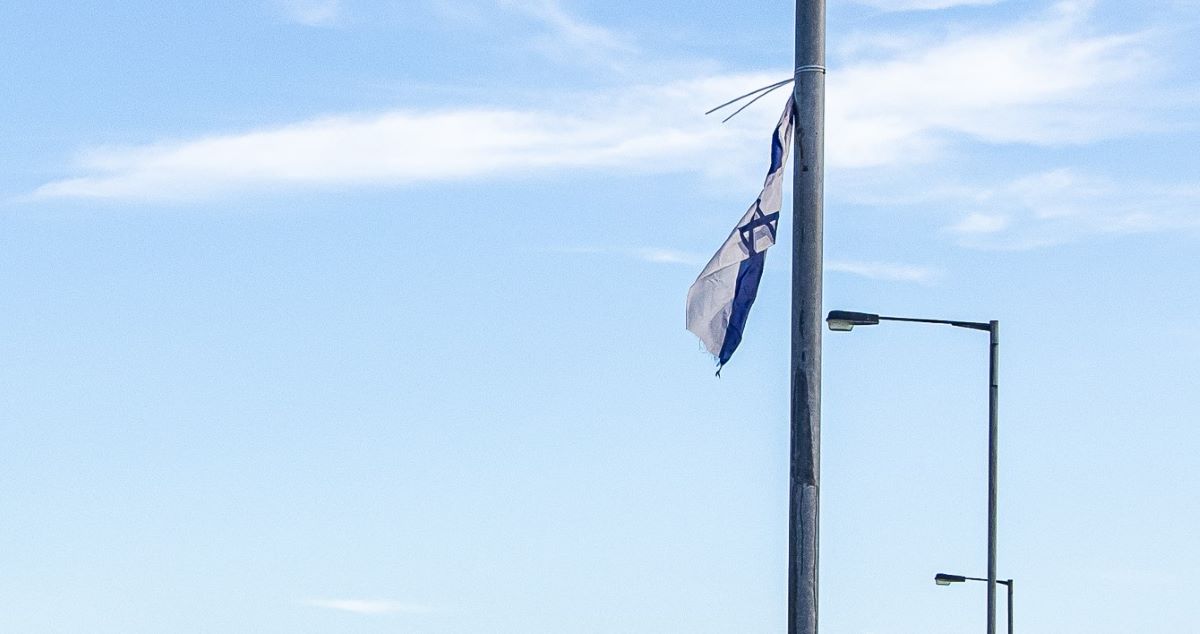 The removal of Israeli flags would ‘raise community tensions’