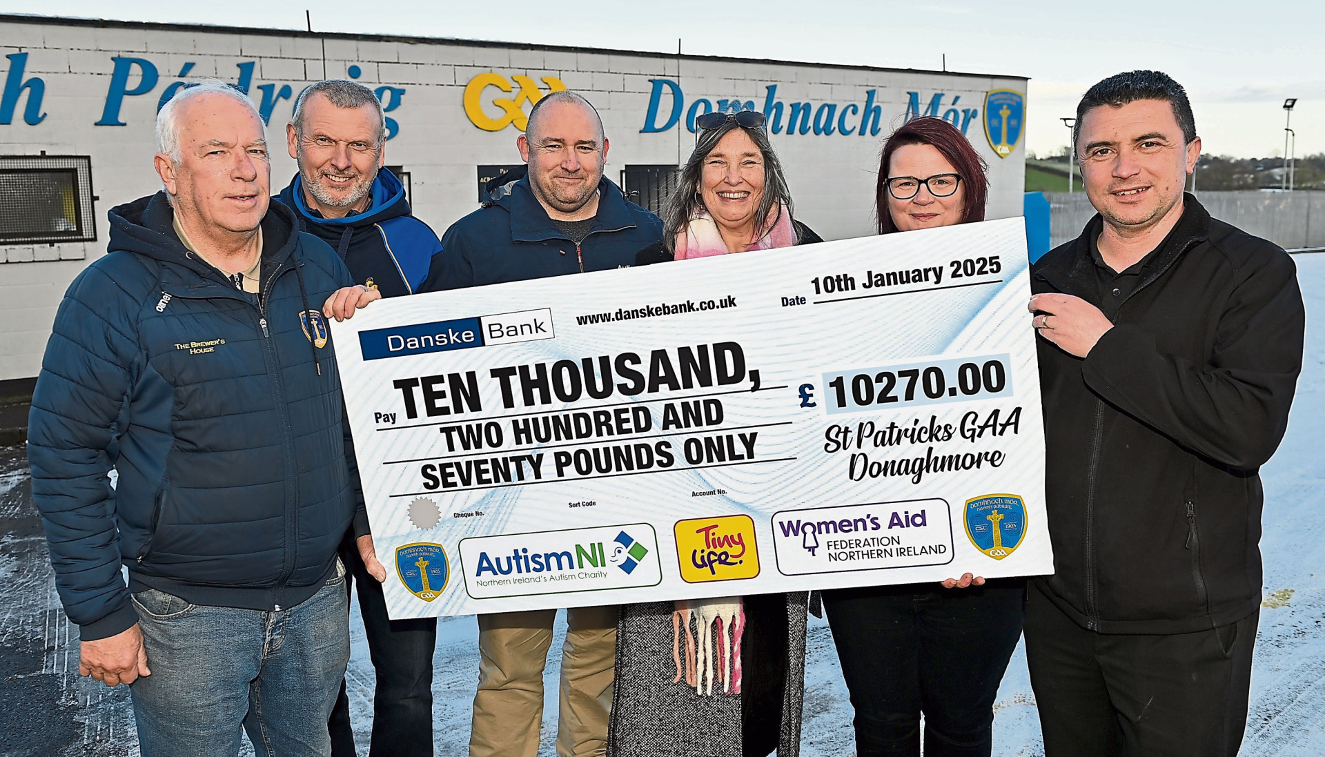 Club members brave the cold to raise £10,000 for charities