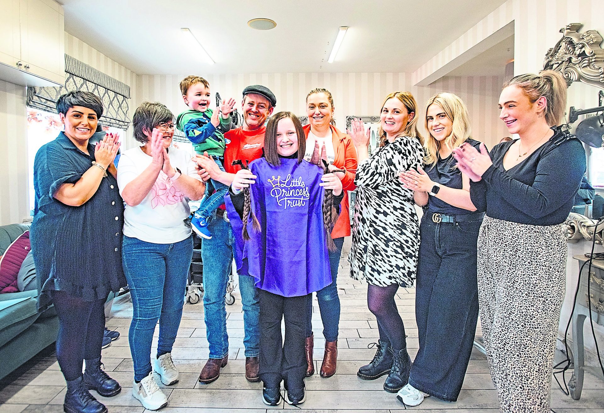 Young cancer survivor donates her hair to help wig charity