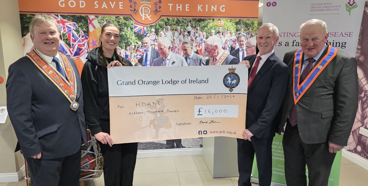 Former Orange Order chief presents £16,000 to charity