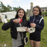 Friends Leah and Abbie finish their strawberry feast. JasMc3
