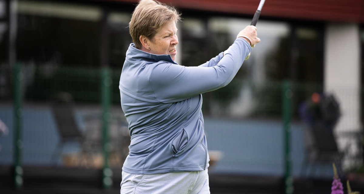 Helen McGaughey sends her ball down the fairway with a good, clean drive. KMG06