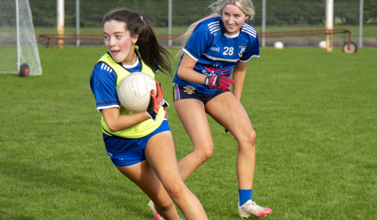 Lucy Sheridan makes her way around Ella McDermott in the fun U14 challenge game on Saturday afternoon. JasMc11