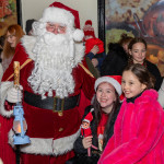 All smiles when Santa stops to say hello.